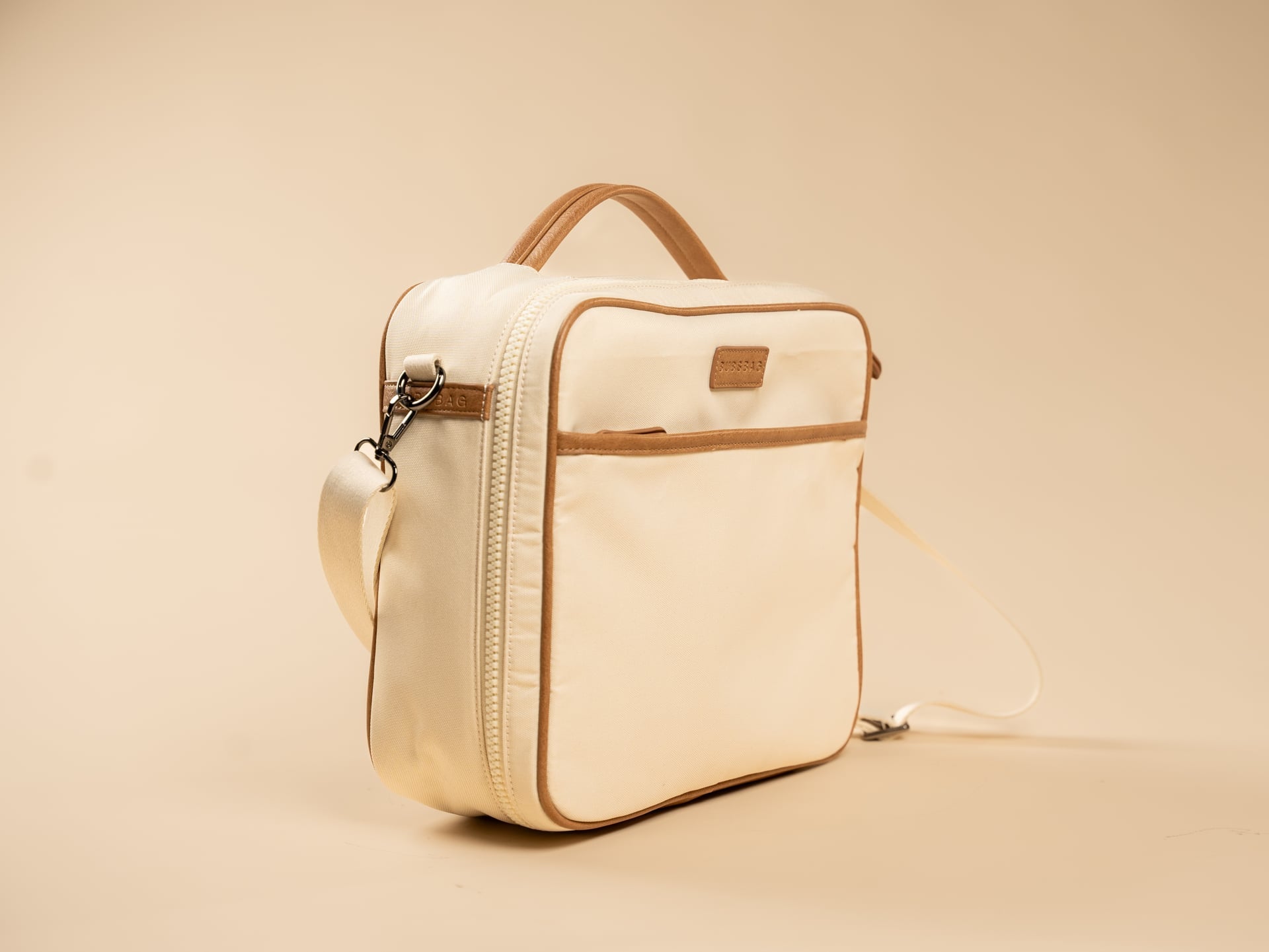 Cream BUBSBAG organized nappy bag with adjustable shoulder strap
