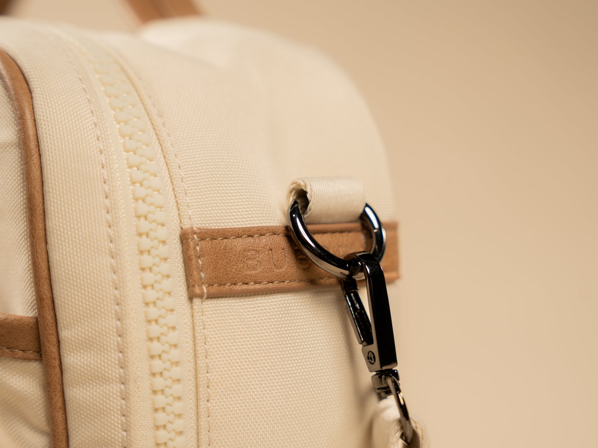 Close-up of premium hardware and shoulder strap attachment on BUBSBAG nappy bag