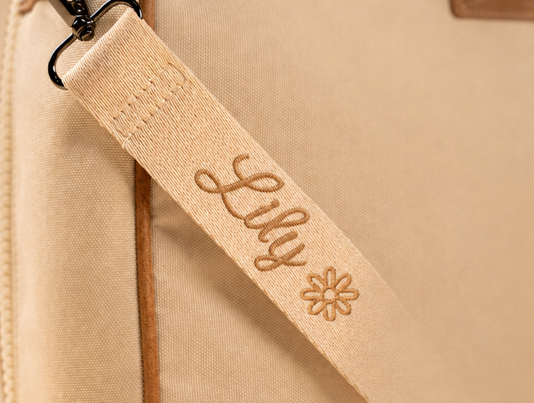 Personalized diaper bag strap with embroidered baby name and personalised icon