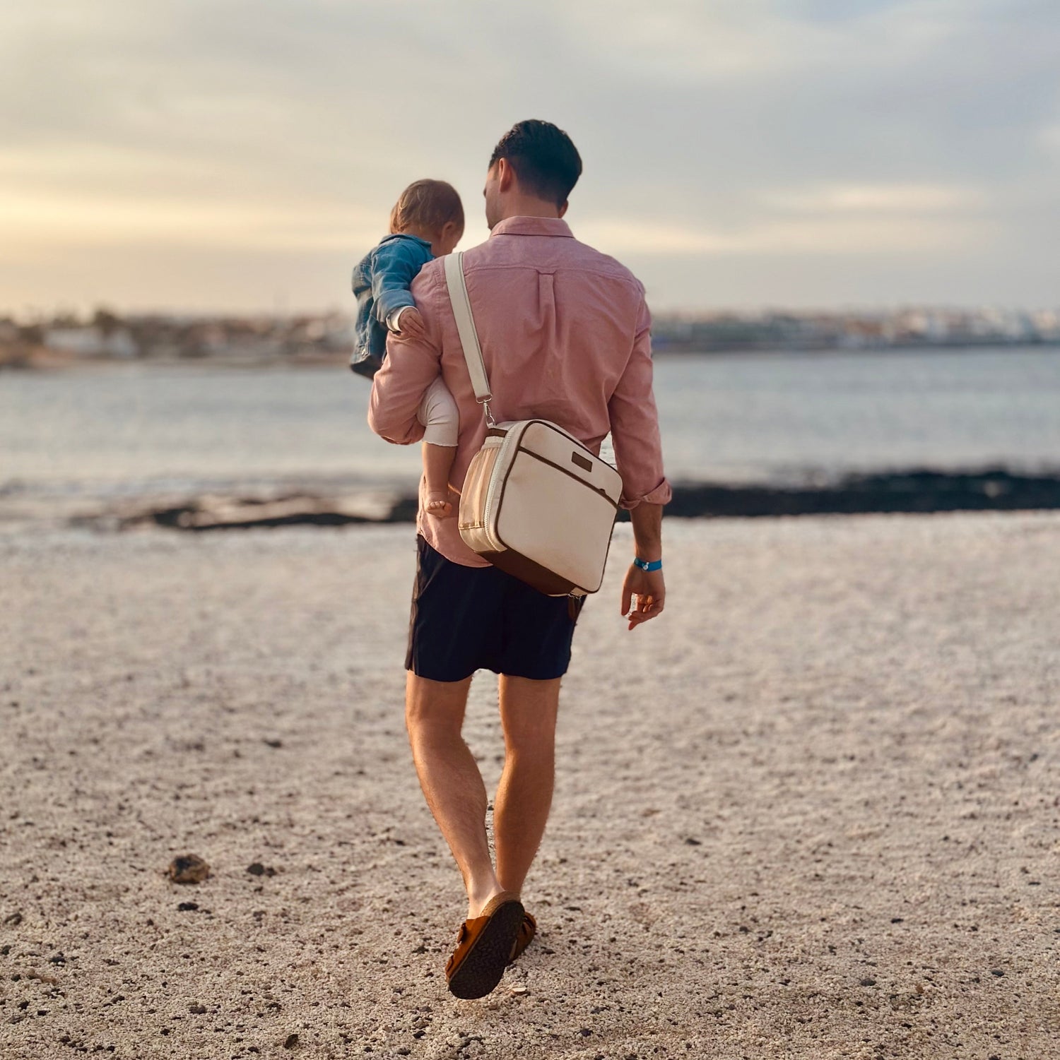 Organized crossbody nappy bag designed for family outings and travel