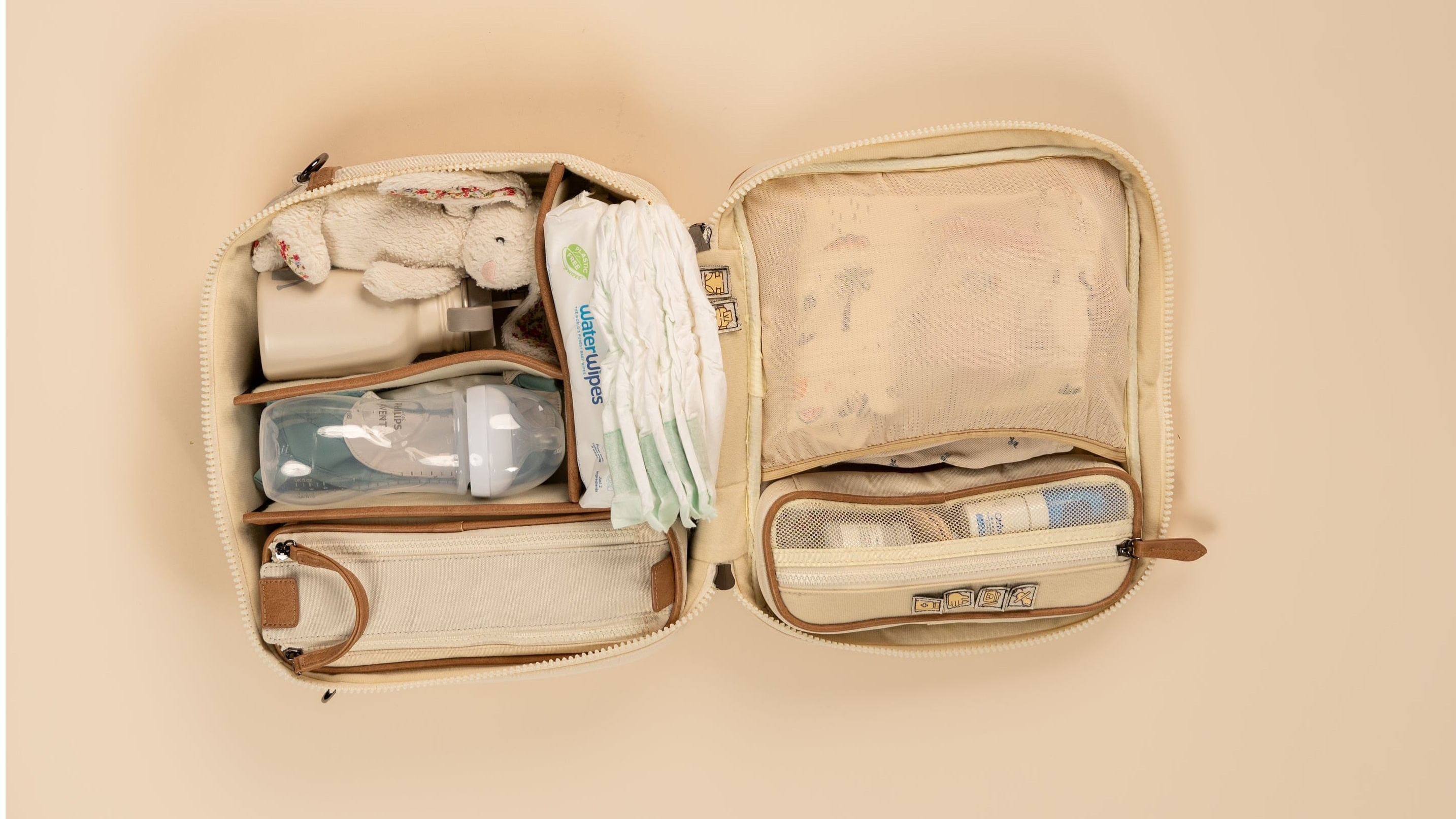 Organized diaper bag with customizable compartments for baby essentials