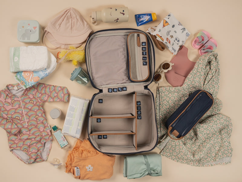 Open BUBSBAG packed with organized baby essentials for a day out at the pool