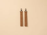Durable stroller straps for attaching an organized nappy bag to any pram